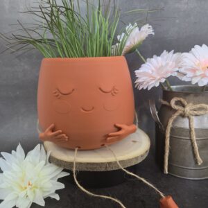 Cache pot heureux